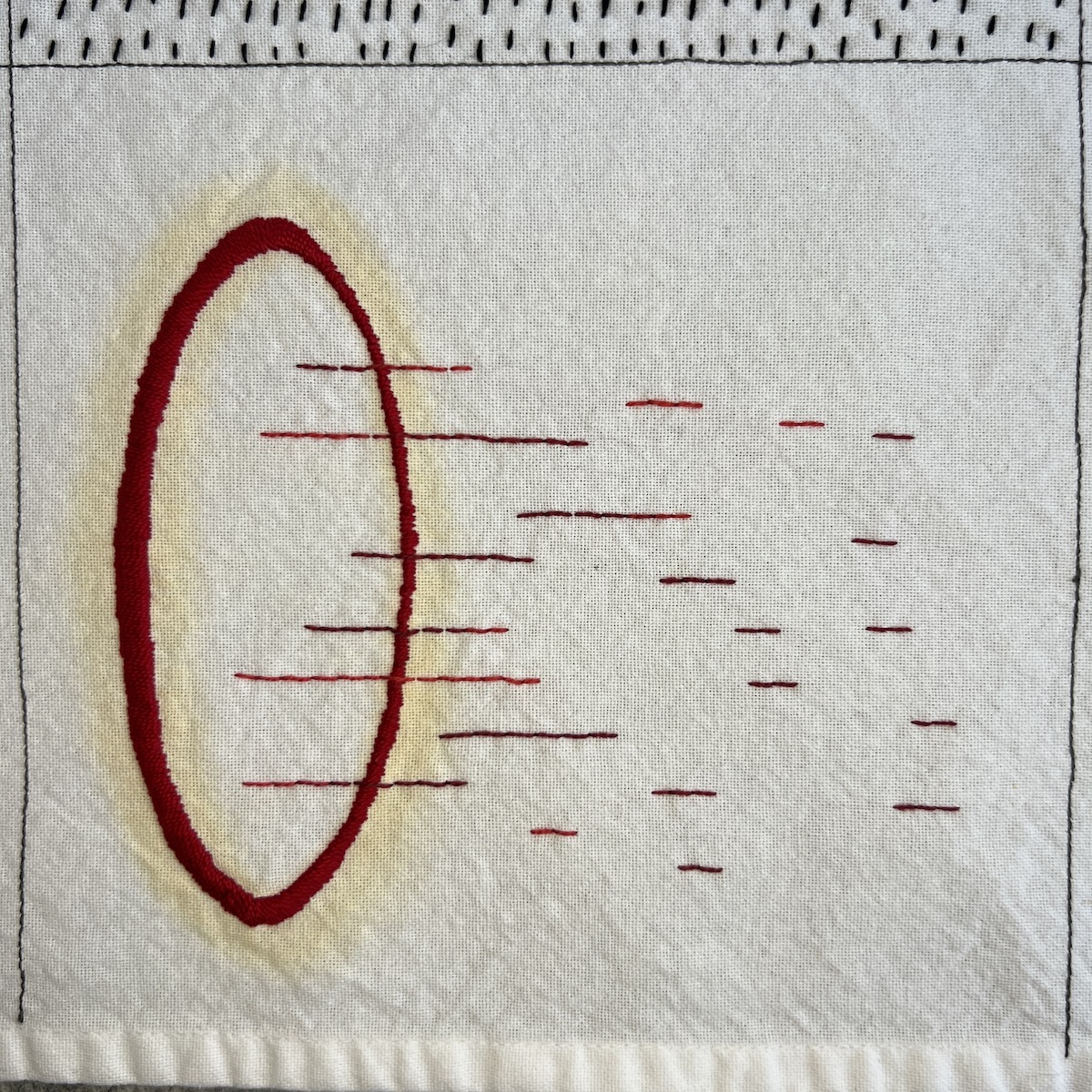 Overhead photo of white fabric 8”x8” square with a thick outline of an oval embroidered in red thread. Variegated red stitches form thin, horizontal lines of varying lengths coming out of the oval.